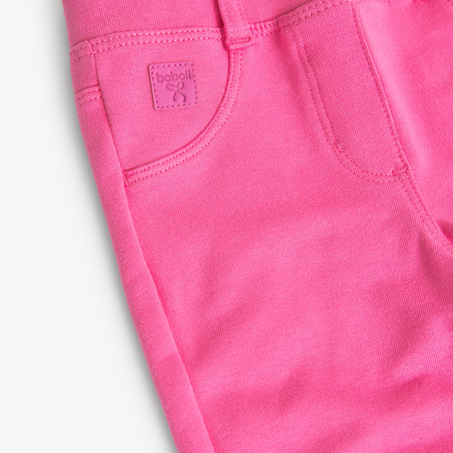 Pantalón felpa stretch rosa bugambilia mini niña