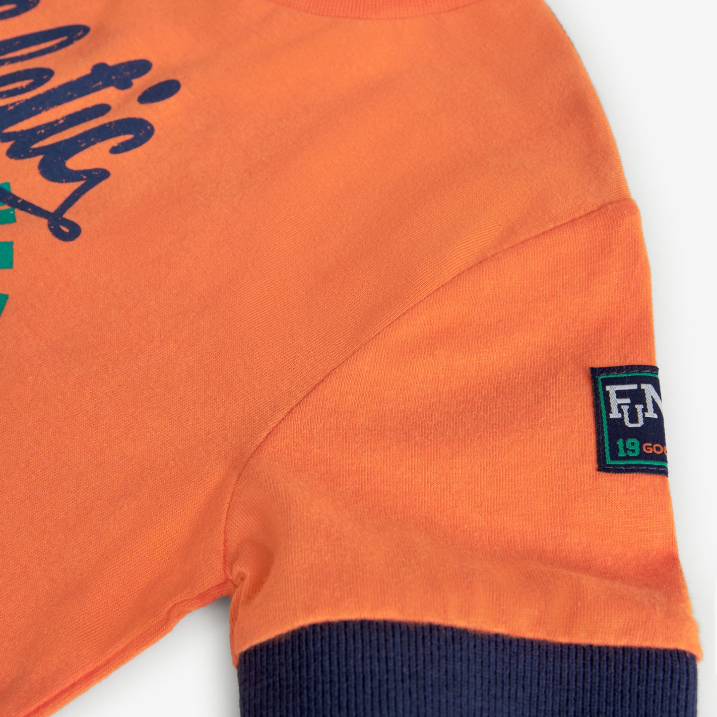 Playera naranja estampada mini niño y niño jr