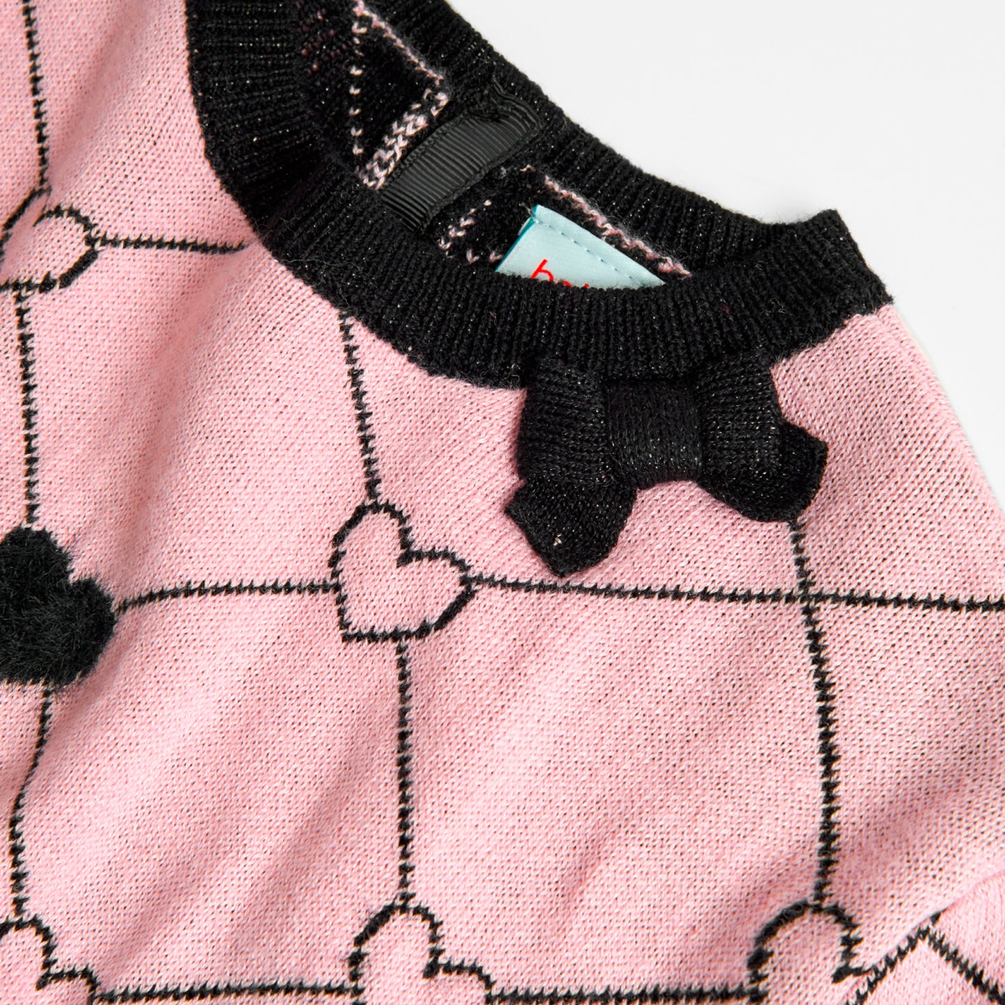 Suéter tricot rosa con negro niña jr