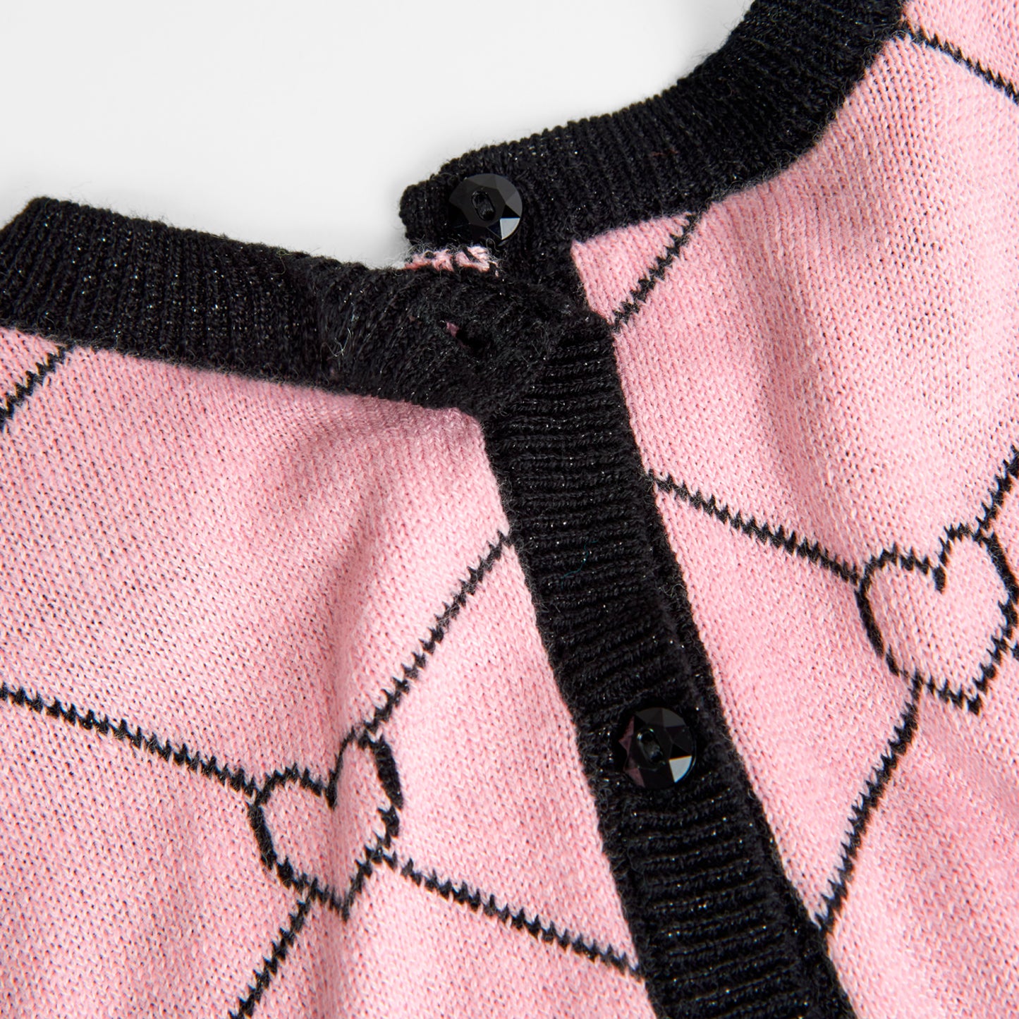 Suéter tricot rosa con negro niña jr