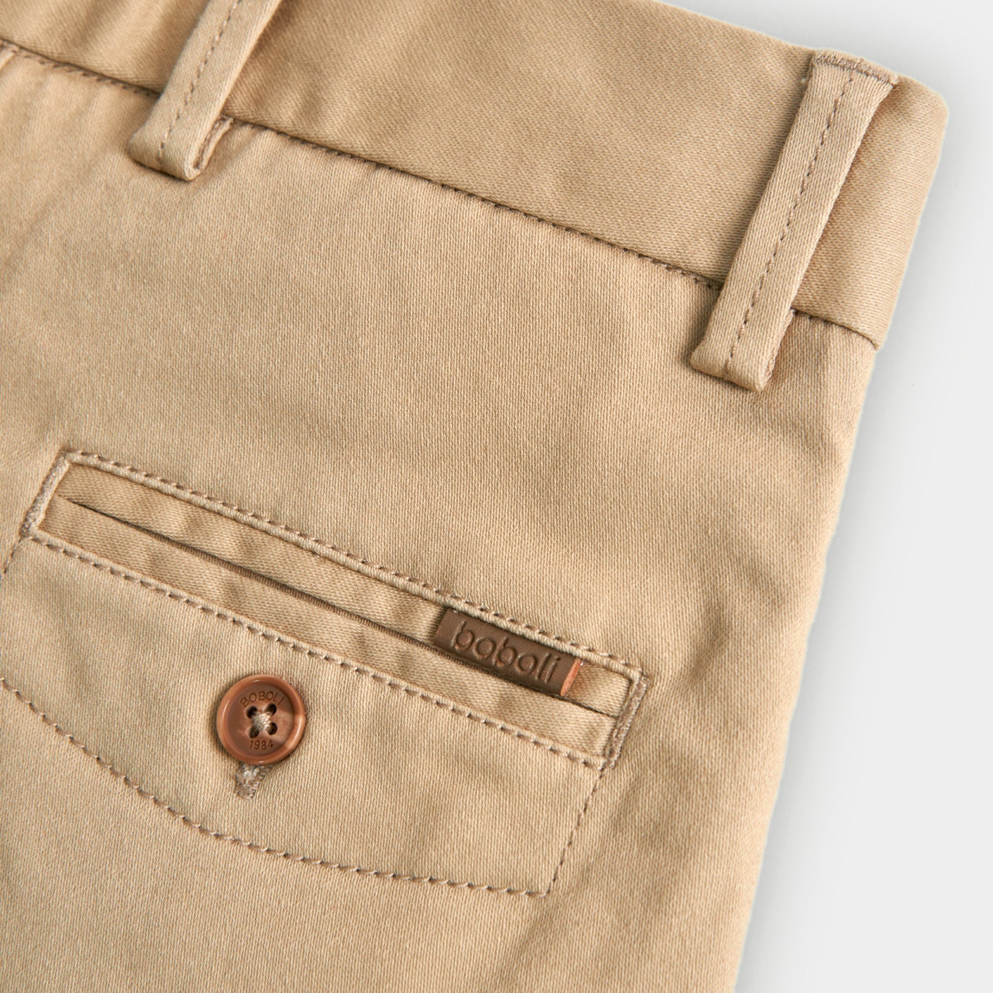 Pantalón satén stretch camel niño jr