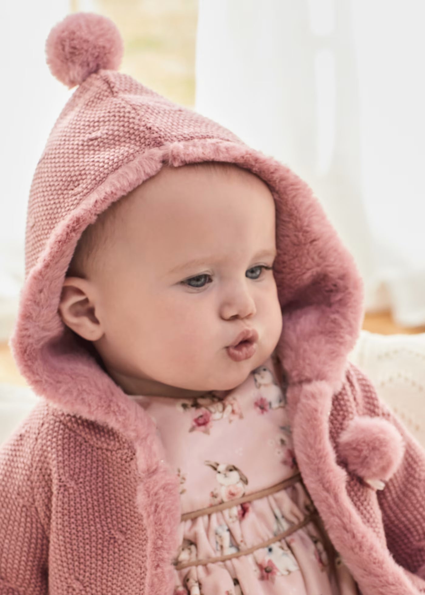 Chamarra tricot rosa con pelo recién nacida