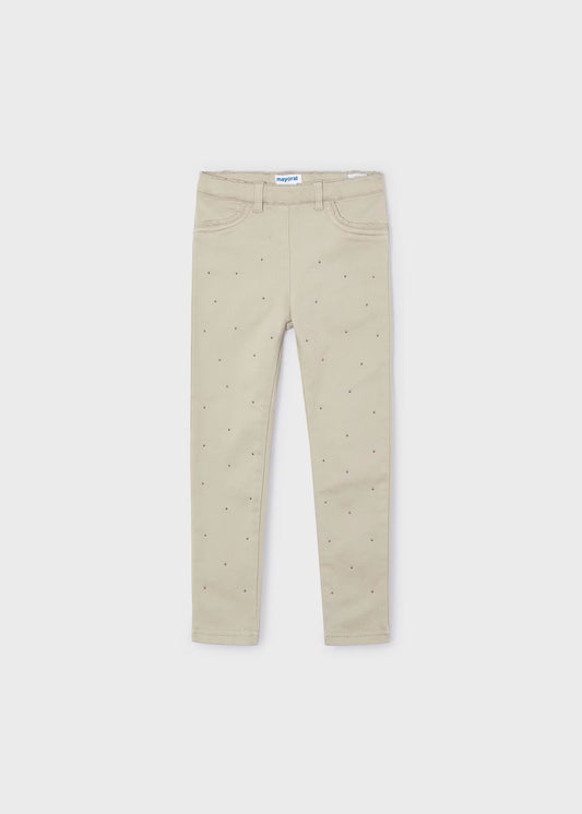 Pantalón beige tachuelas para mini niña