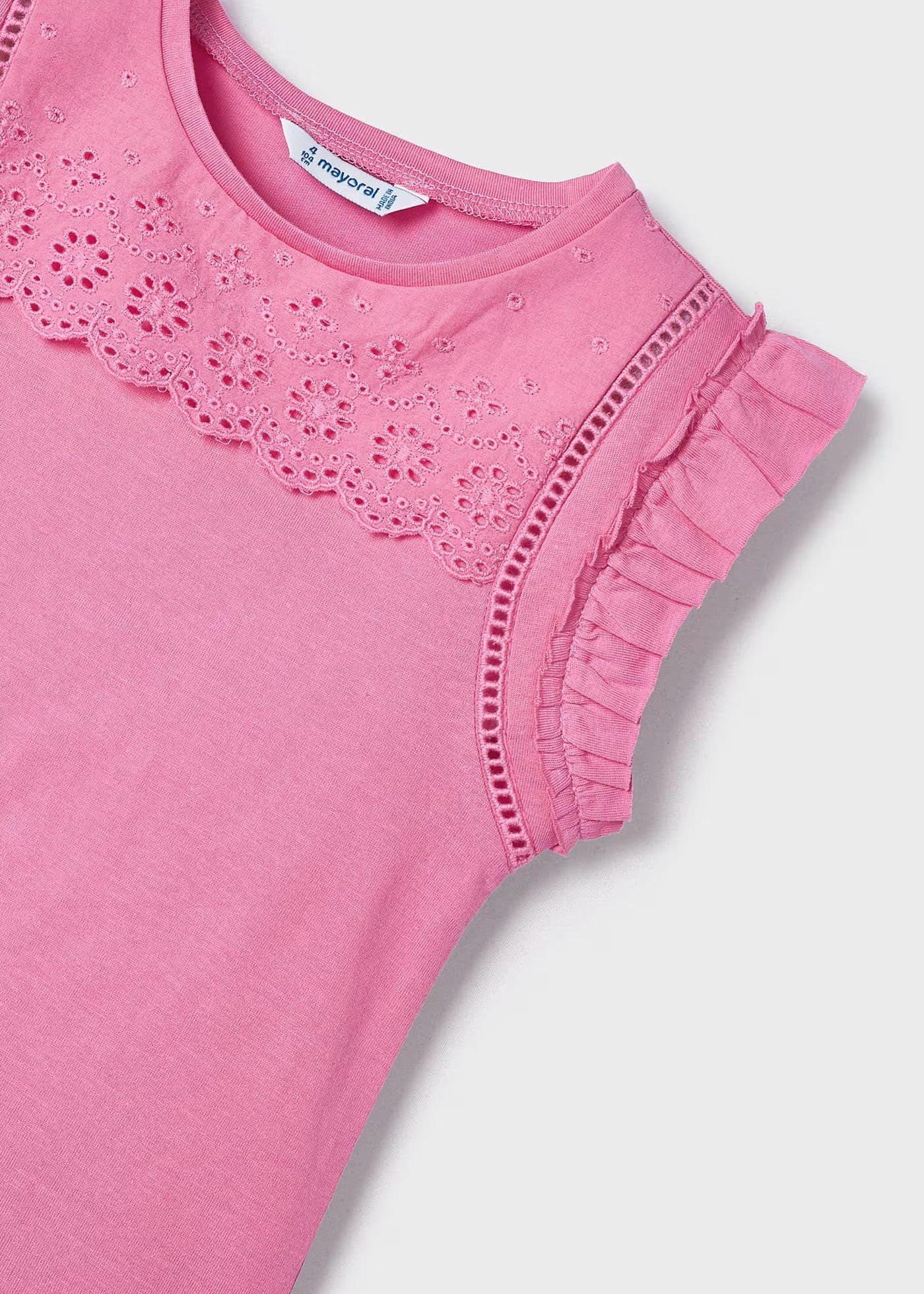 Blusa rosa con perforaciones mini niña