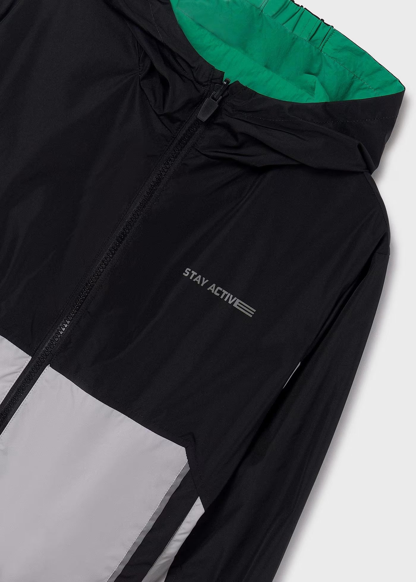 Impermeable reversible verde/negro niño jr