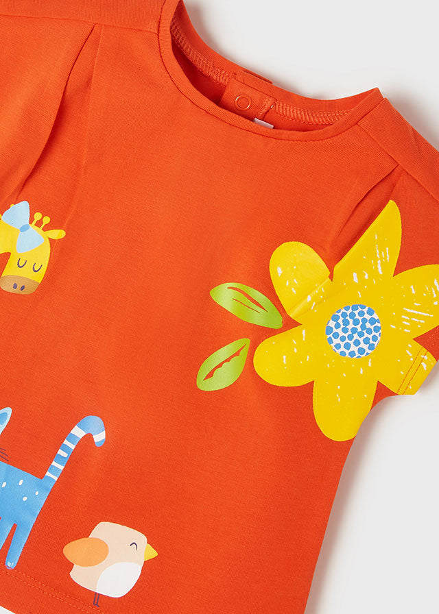 Camiseta con mensaje bordado naranja bebé niña